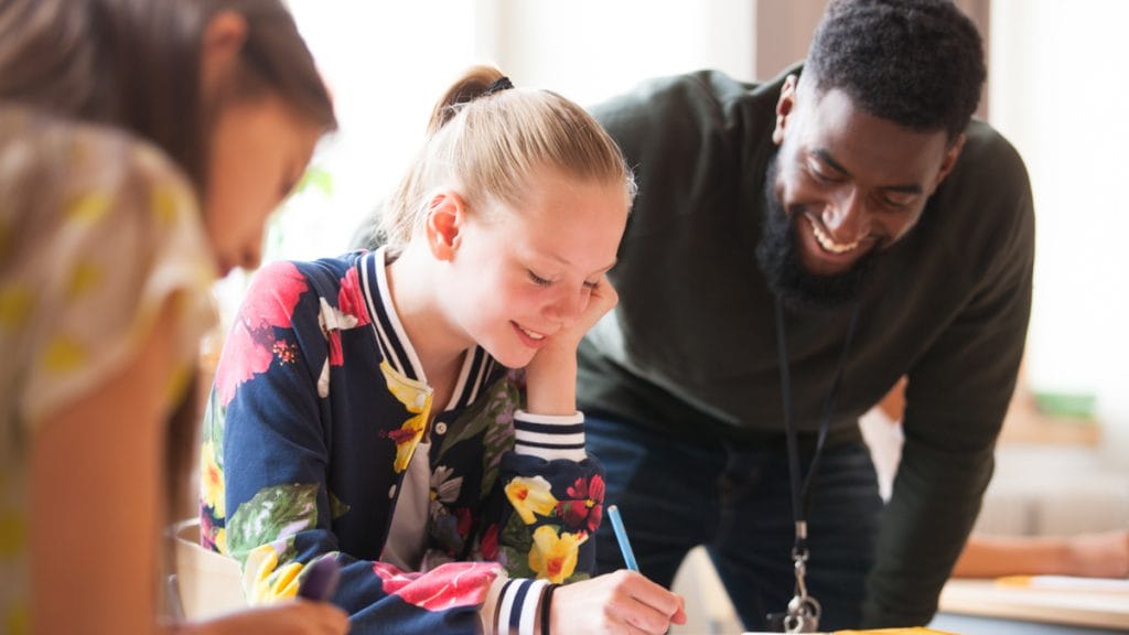 A study counselor advising a student.
