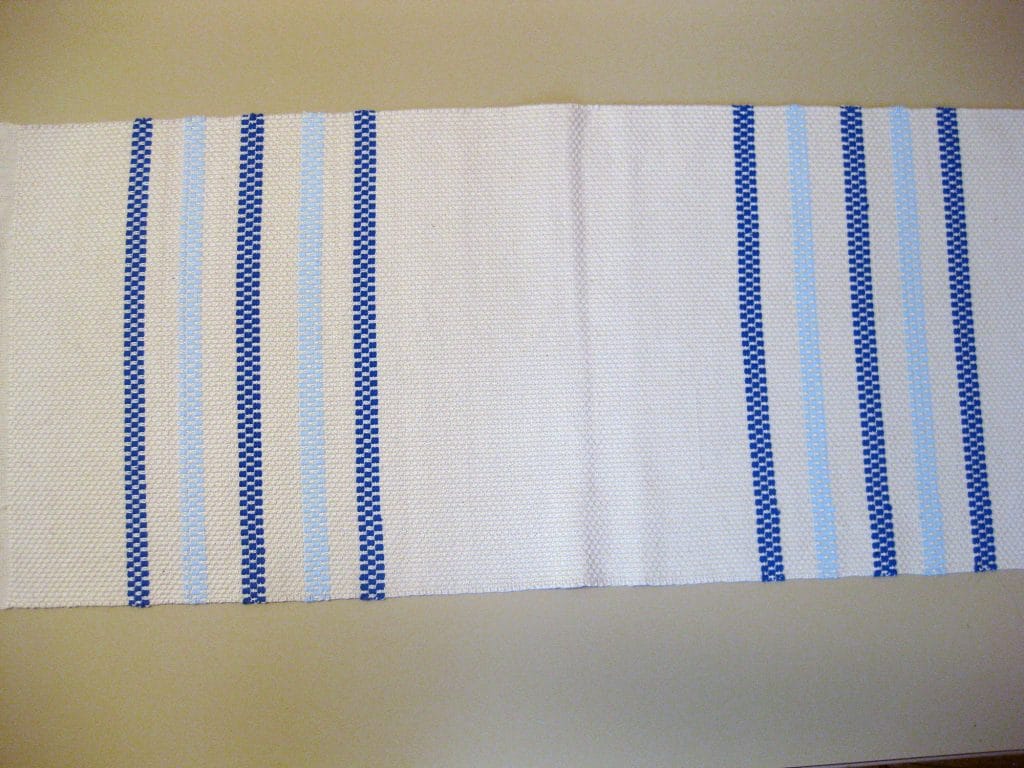 Kaitaliina, puuvillaa.