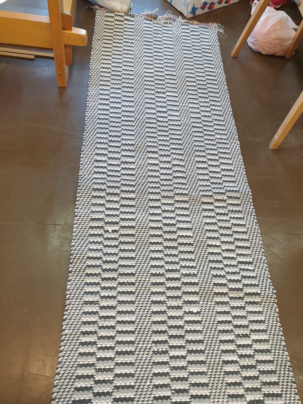 Onnenpolku, kudottu tekstiili.