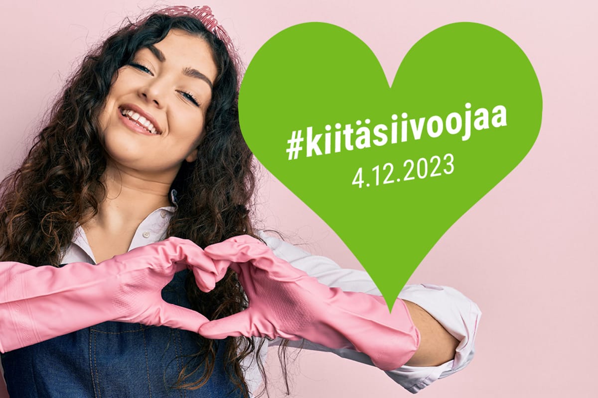 Nainen tekee käsillään sydämen.