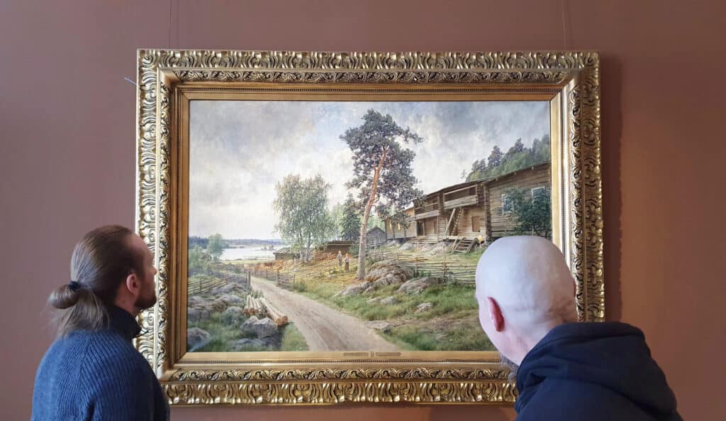 Roosin talolla kaksi miestä katsoo Berndt Lindholmin Hämälaista maisemaa